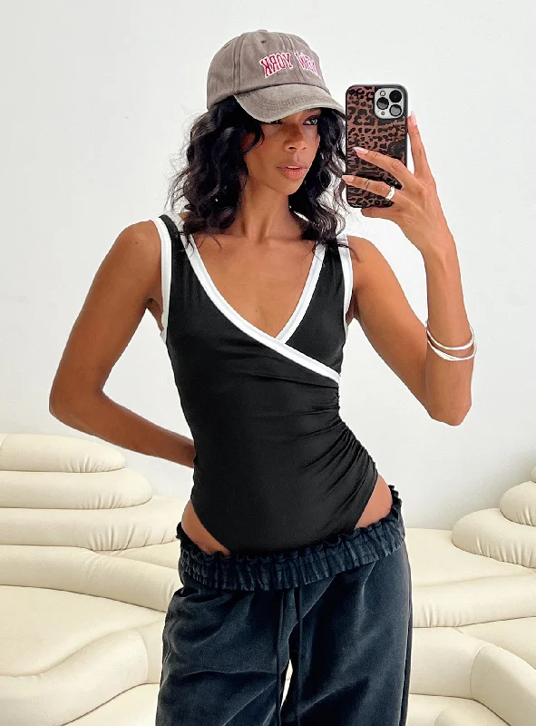 Zip-up vest – Vest that zips up the front, often with a high collarZip-up vest – Vest that zips up the front, often with a high collarFiorah Bodysuit Black / White Zip-up vest – Vest that zips up the front, often with a high collarZip-up vest – Vest that zips up the front, often with a high collarFiorah Bodysuit Black / White