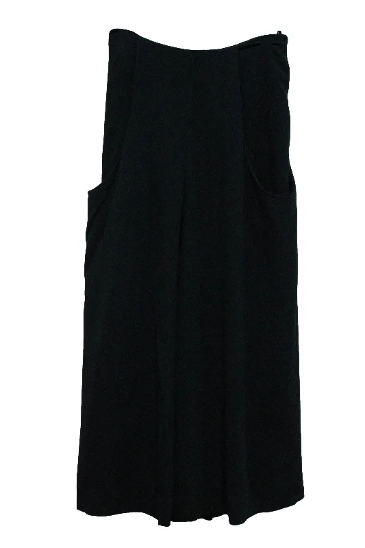 Tapered trousers – Trousers that narrow toward the ankle, creating a more fitted, streamlined look.Tapered trousers – Trousers that narrow toward the ankle, creating a more fitted, streamlined look.The Row Wide Pants in Navy Blue Viscose