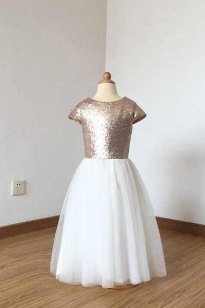 Asymmetrical skirt – Skirt with an uneven or diagonal hemline for a modern and unique appearance.Asymmetrical skirt – Skirt with an uneven or diagonal hemline for a modern and unique appearance.Rose-gold Sequin Flower Girl Dress with Tulle Skirt Asymmetrical skirt – Skirt with an uneven or diagonal hemline for a modern and unique appearance.Asymmetrical skirt – Skirt with an uneven or diagonal hemline for a modern and unique appearance.Rose-gold Sequin Flower Girl Dress with Tulle Skirt