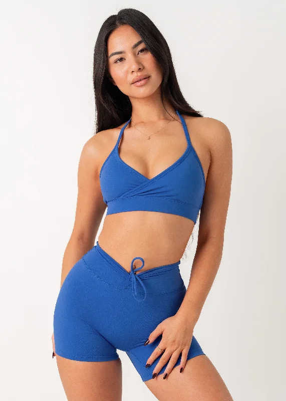 Vegan sports bra – Sports bra made from eco-friendly, cruelty-free materials, suitable for ethical consumers.Vegan sports bra – Sports bra made from eco-friendly, cruelty-free materials, suitable for ethical consumers.POISE HALTER BRA - COBALT